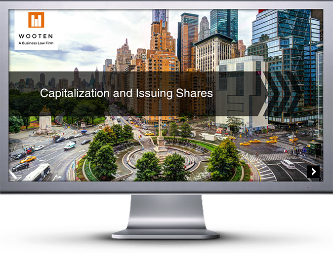 Computer monitor showing Wooten Law Firm logo along with the title of course Capitalization and Issuing Shares